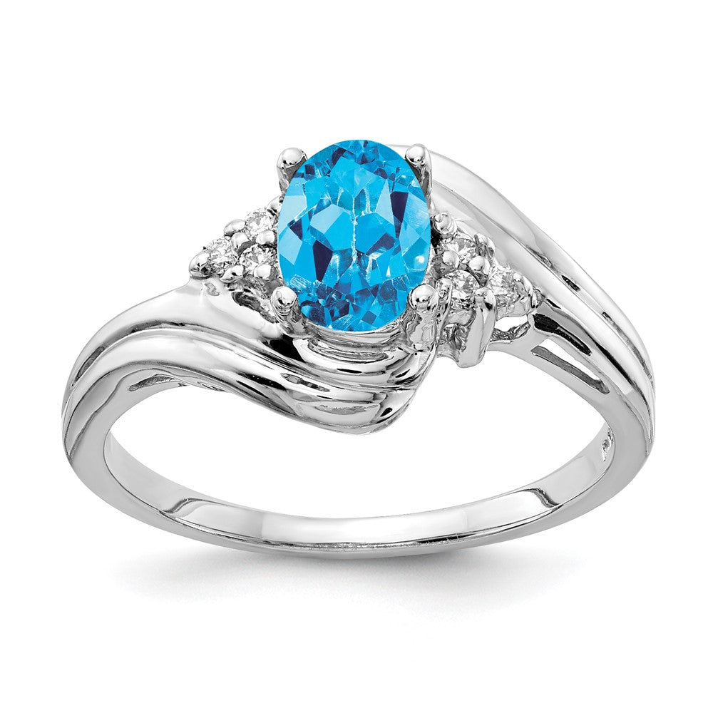 14k White Gold 7x5mm Oval Blue Topaz and 1/15 carat VS Diamond Ring