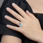 14k White Gold 7x5mm Oval Blue Topaz Ring