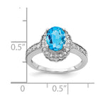 14k White Gold 8x6mm Oval Blue Topaz and 1/3 carat AA Diamond Halo Ring
