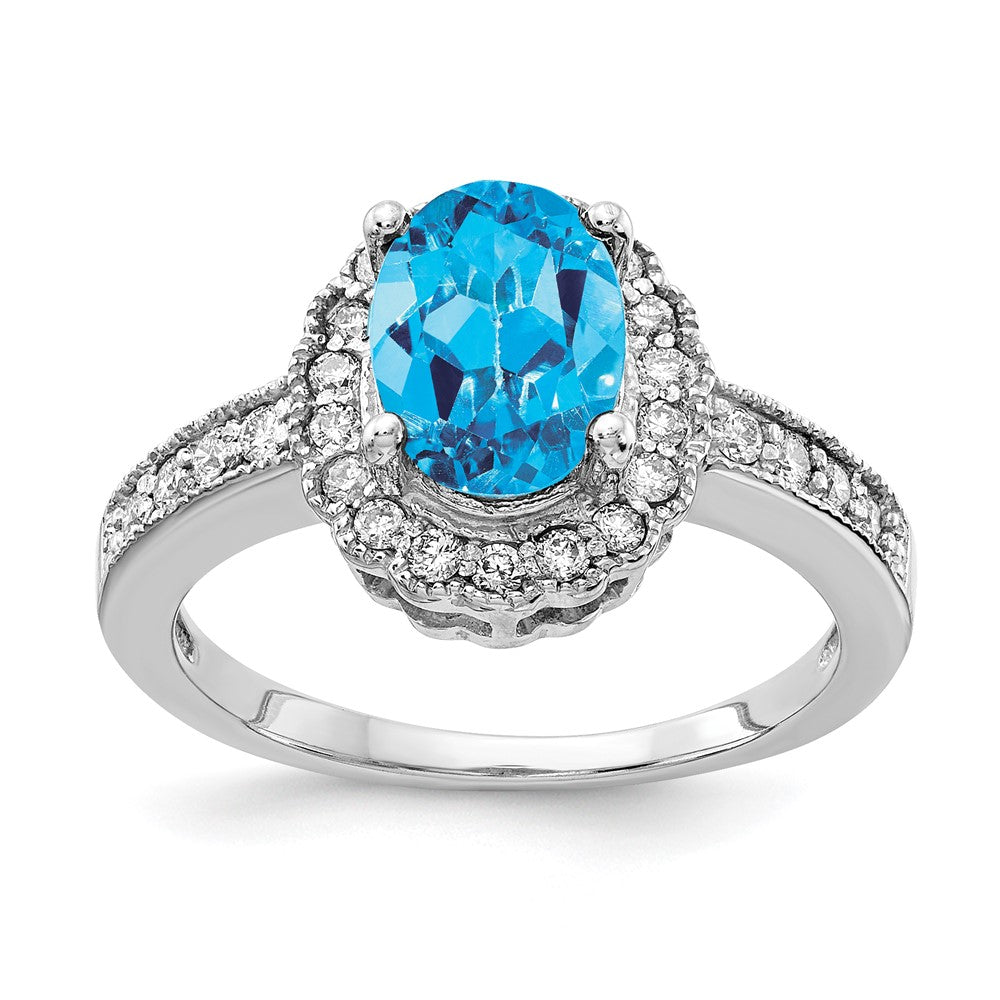 14k White Gold 8x6mm Oval Blue Topaz and 1/3 carat AA Diamond Halo Ring