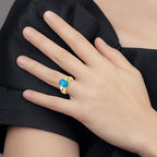14k 11x9mm Oval Blue Topaz Ring