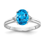 14k White Gold 8x6mm Oval Blue Topaz and A Diamond Ring