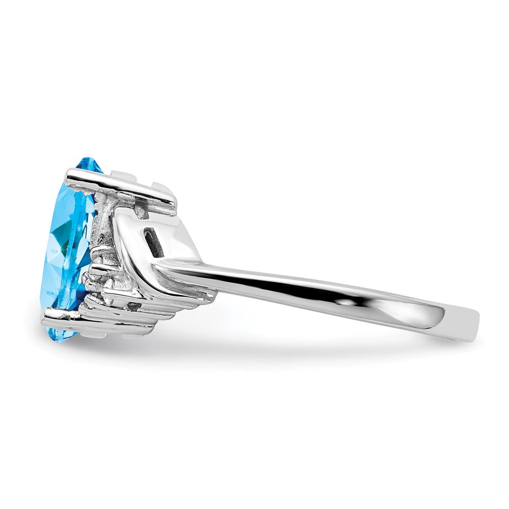 14k White Gold 10x8mm Oval Blue Topaz and 1/15 carat VS Diamond Ring