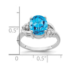 14k White Gold 10x8mm Oval Blue Topaz and 1/15 carat AAA Diamond Ring