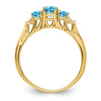 14k 6x4 / 5x3mm Oval Blue Topaz and Diamond 3-Stone Ring