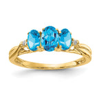 14k 6x4 / 5x3mm Oval Blue Topaz and Diamond 3-Stone Ring