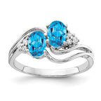 14k White Gold 6x4mm Oval Blue Topaz and 1/20 carat AAA Diamond 2-Stone Ring