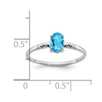 14k White Gold 6x4mm Oval Blue Topaz Ring