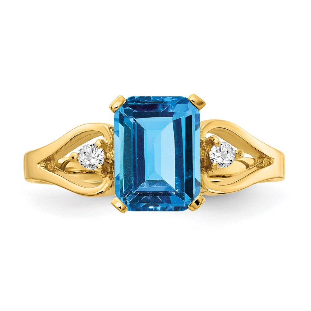 14k 8x6mm Emerald-cut Blue Topaz and 1/20 carat A Diamond Ring