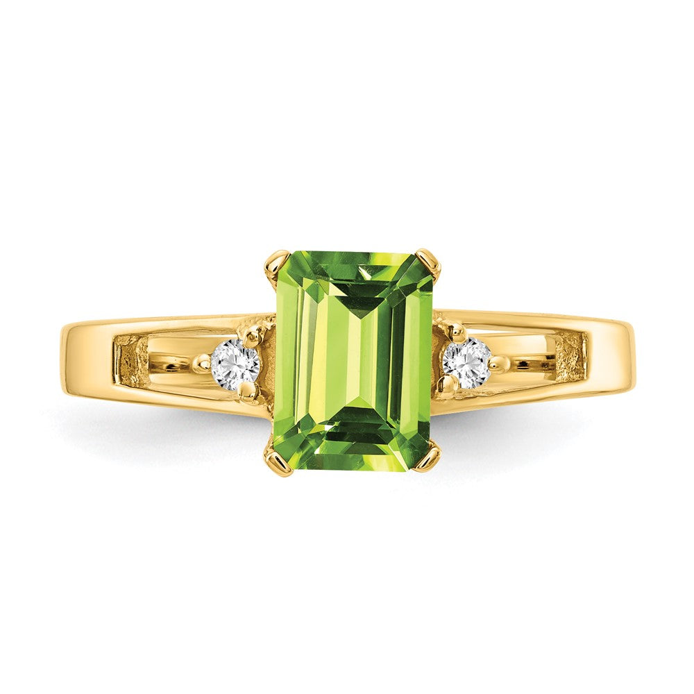 14k 7x5mm Emerald Cut Peridot VS Diamond ring