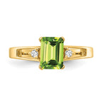 14k 7x5mm Emerald Cut Peridot VS Diamond ring