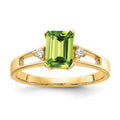 14k 7x5mm Emerald Cut Peridot VS Diamond ring