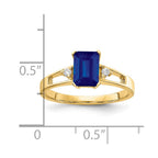 14k 7x5mm Emerald-cut Blue Sapphire and 1/20 carat AA Diamond Ring