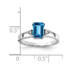 14k White Gold 7x5mm Emerald-cut Blue Topaz and 1/20 carat AA Diamond Ring