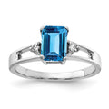 14k White Gold 7x5mm Emerald-cut Blue Topaz and 1/20 carat A Diamond Ring